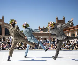 GORKA BRAVO Three dancers perform with their backs turned